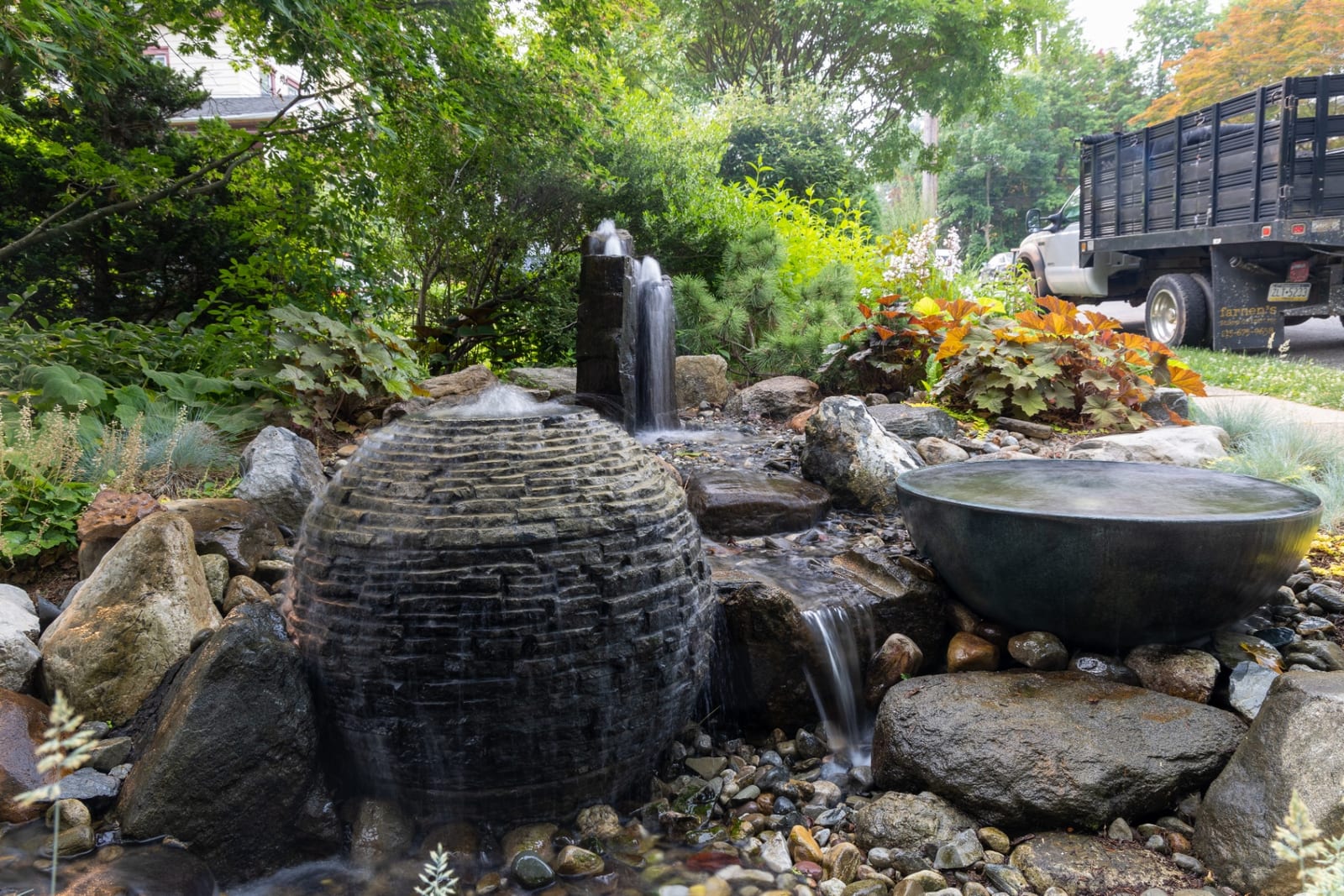 Beehive fountain with basalt column and spillway bowl by AquaReale Philadelphia