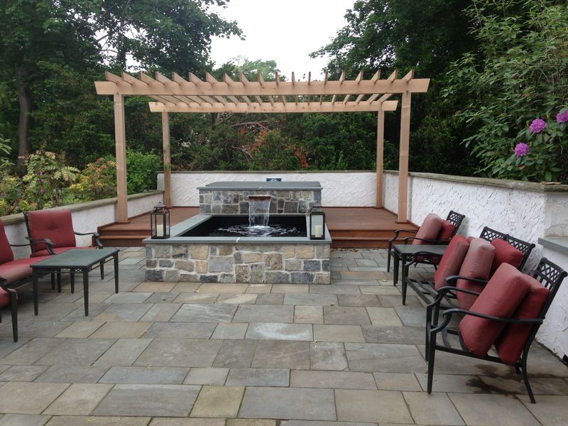 Formal pond with pergola in Montgomery County