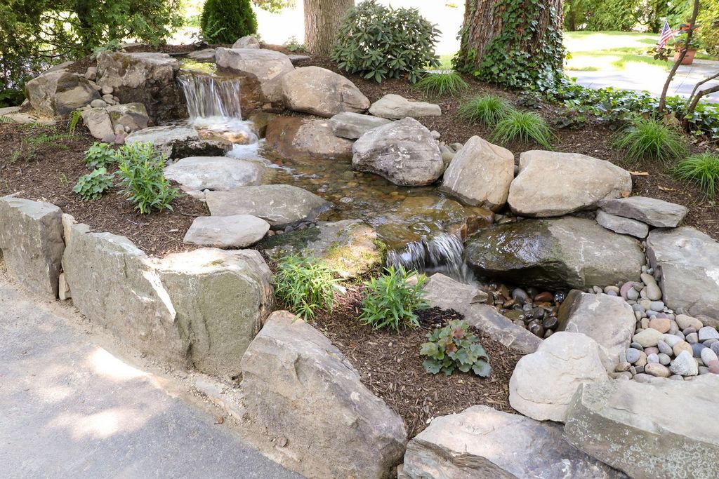 Disappearing waterfall in Delaware County garden
