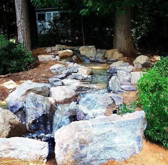 Disappearing waterfall stream installation in South Jersey