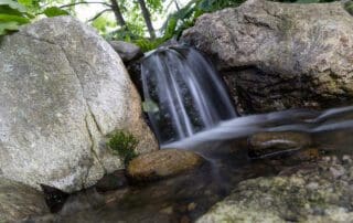 Small waterfall in rocky stream