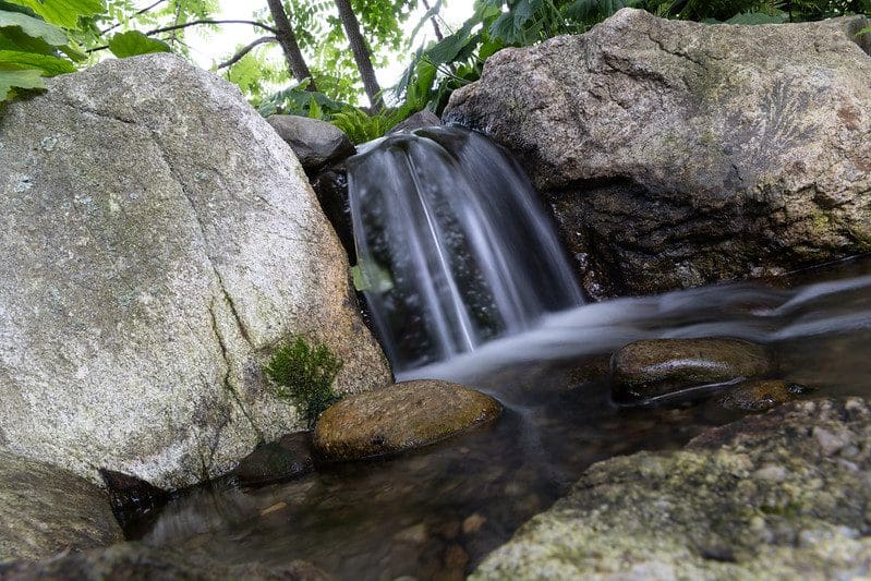 Small waterfall in rocky stream